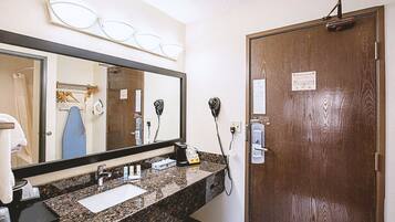 Separate tub and shower, designer toiletries, hair dryer, towels