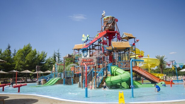 A water park with a large slide, a wave pool, and a sign reading "Solaris Aquapark". - Apartments Valeva Exclusive (Sibenik)