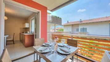 Family Apartment, Multiple Bedrooms (Casa Margherita Few Minutes From Lake) | Outdoor dining