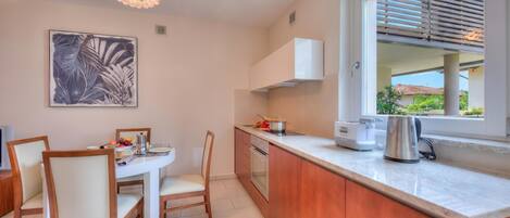 Family Apartment, 1 Bedroom, Balcony (Casa Margherita Few Minutes From Lake) | Private kitchen | Fridge, oven, stovetop, coffee/tea maker