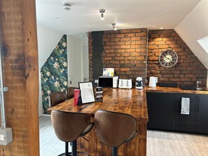 Deluxe Quadruple Room, Multiple Beds | Individually decorated, individually furnished, desk, free WiFi