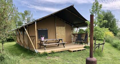 Comfortably furnished safari tent in the Dutch countryside