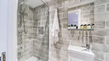 Apartment, 2 Queen Beds | Bathroom | Shower, hair dryer, towels, soap