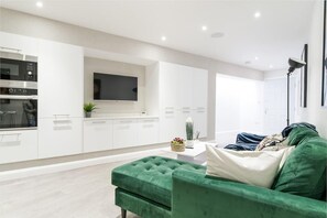 Apartment, 2 Queen-Betten | Wohnzimmer