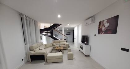 Design house, with all the comforts, large common areas and well located