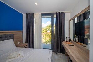 Biancheria da letto di alta qualità, minibar, cassaforte in camera