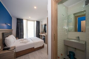 Ropa de cama de alta calidad y minibar 