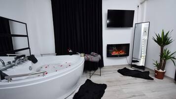 Combined shower/tub, jetted tub