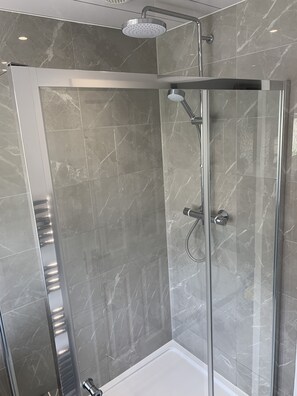 Shower, eco-friendly toiletries, hair dryer, towels