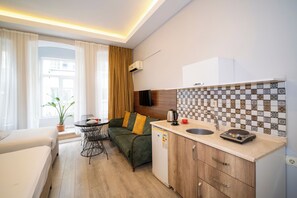 Suite Deluxe | Cuisine privée | Mini réfrigérateur, plaque de cuisson, plancha