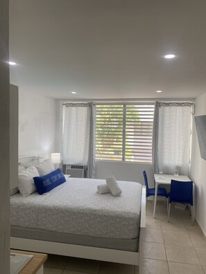 1 habitación, tabla de planchar con plancha, wifi gratis y ropa de cama 