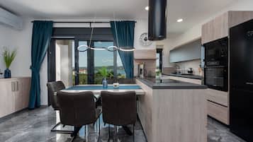 Villa, 4 Bedrooms, Private Pool, Sea View | Private kitchen | Microwave, dishwasher, coffee/tea maker, high chair