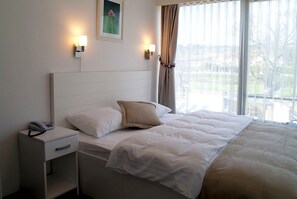 Sábanas de algodón egipcio, ropa de cama de alta calidad y minibar