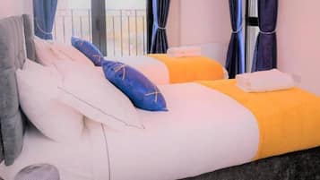 2 عدّة غرف نوم ومكواة/لوح كي وواي فاي مجانًا وملاءات أسرّة