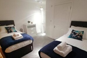 Departamento, varias camas | 2 habitaciones, tabla de planchar con plancha y wifi gratis 