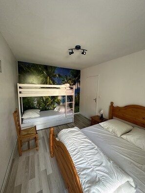 4 bedrooms, iron/ironing board, travel crib