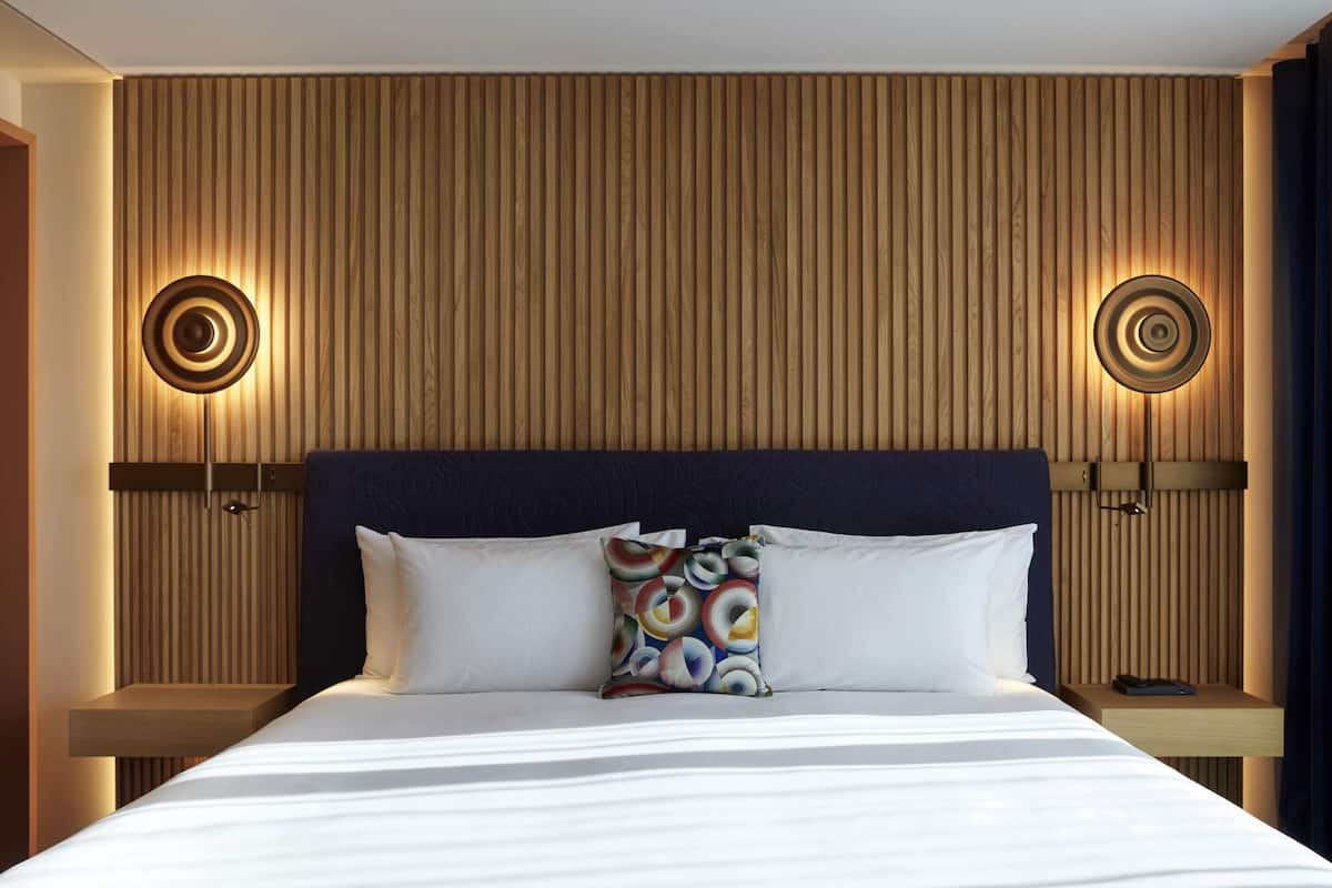 Premium bedding, down duvets, pillow-top beds, free minibar items