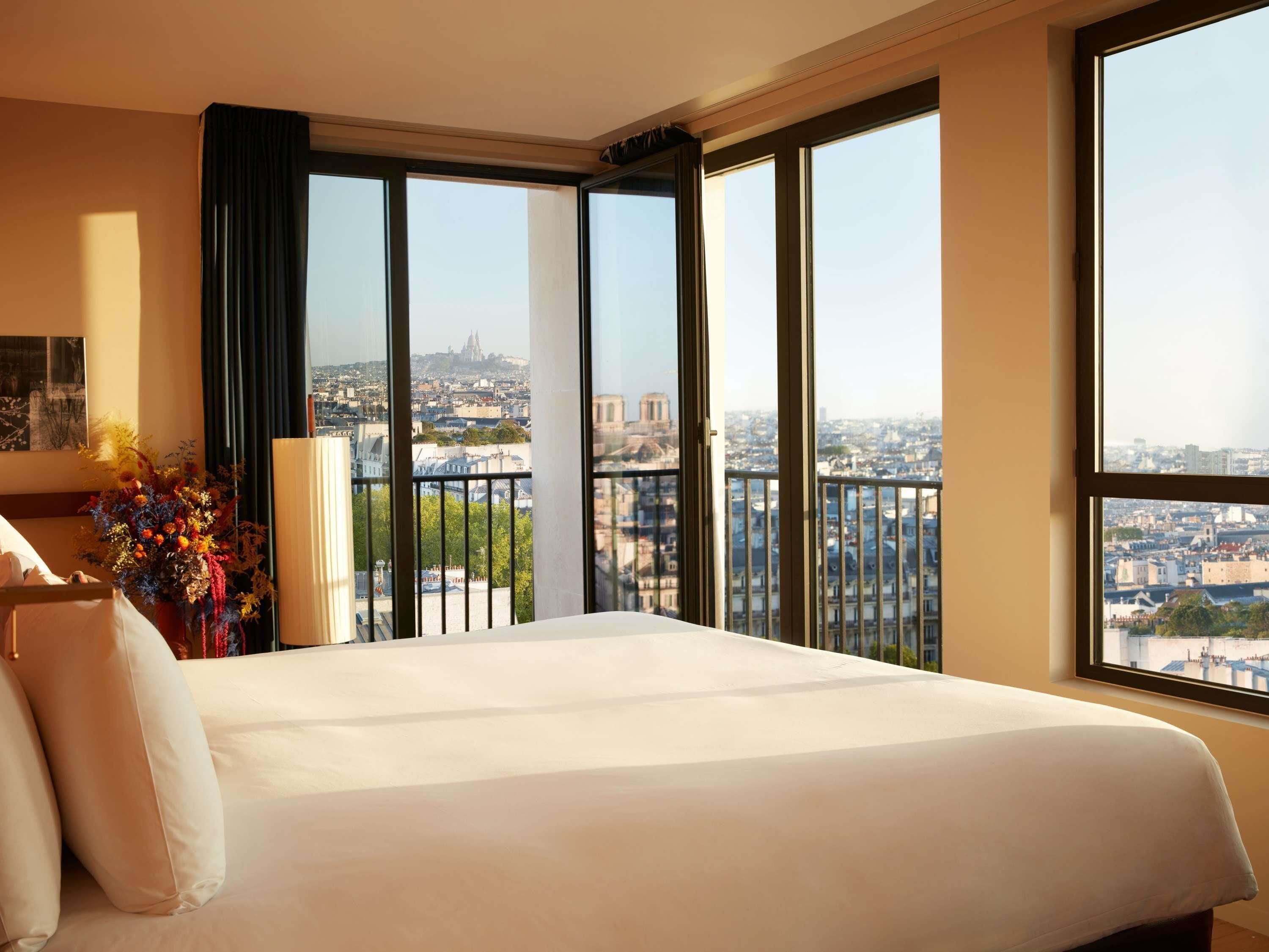 Suite Junior, 1 letto king, balcone (Paris view) | Biancheria da letto di alta qualità, copriletto in piuma