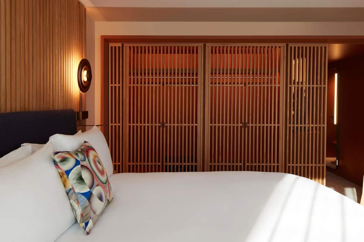 Premium bedding, down duvets, pillow-top beds, free minibar items