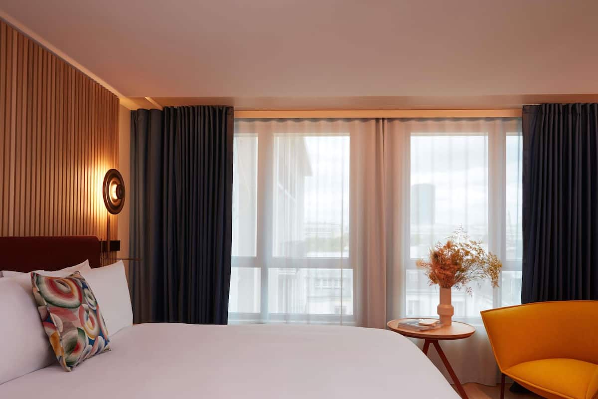 Premium bedding, down duvets, pillow-top beds, free minibar items