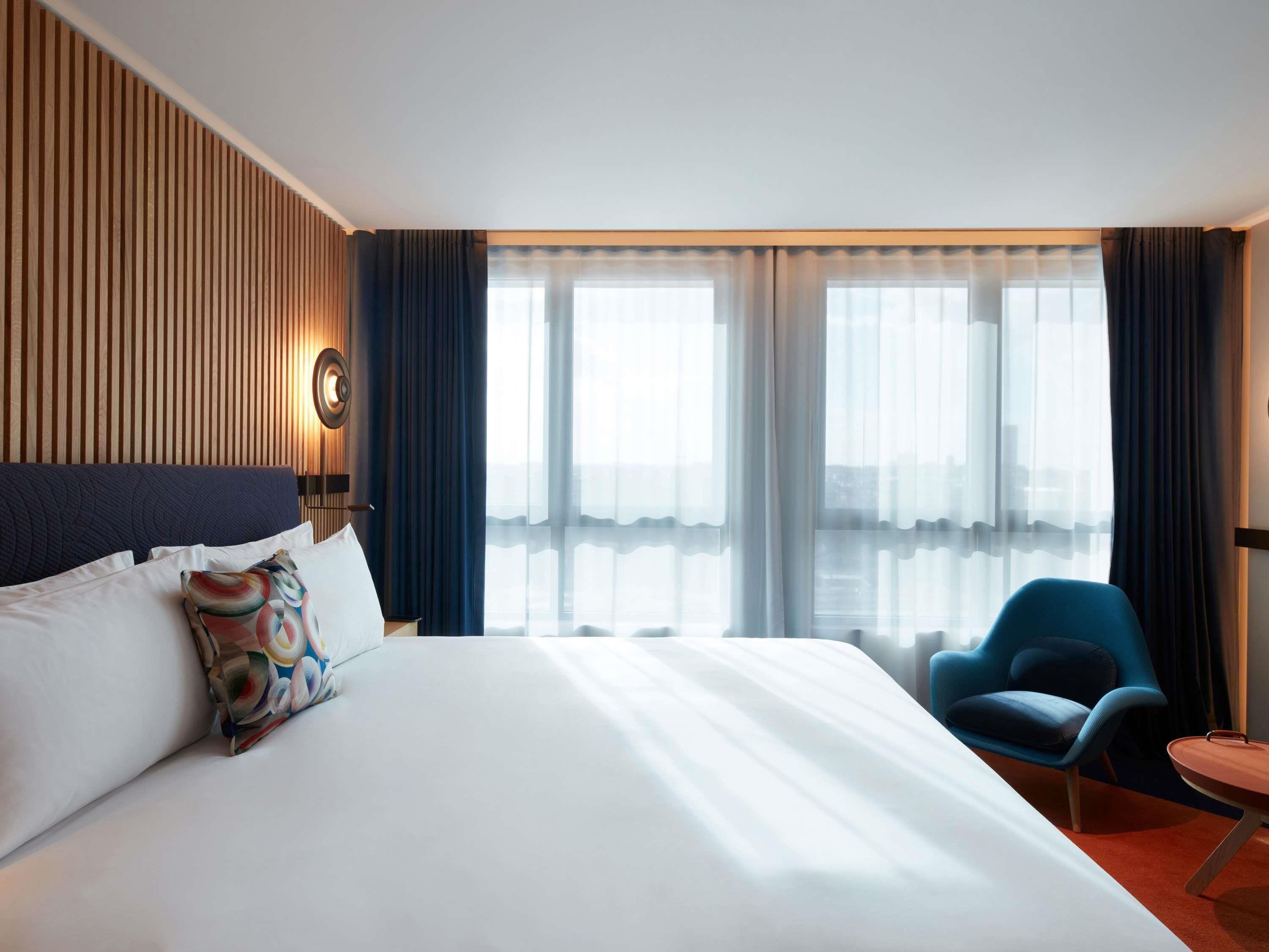 Premium bedding, down comforters, pillowtop beds, free minibar items