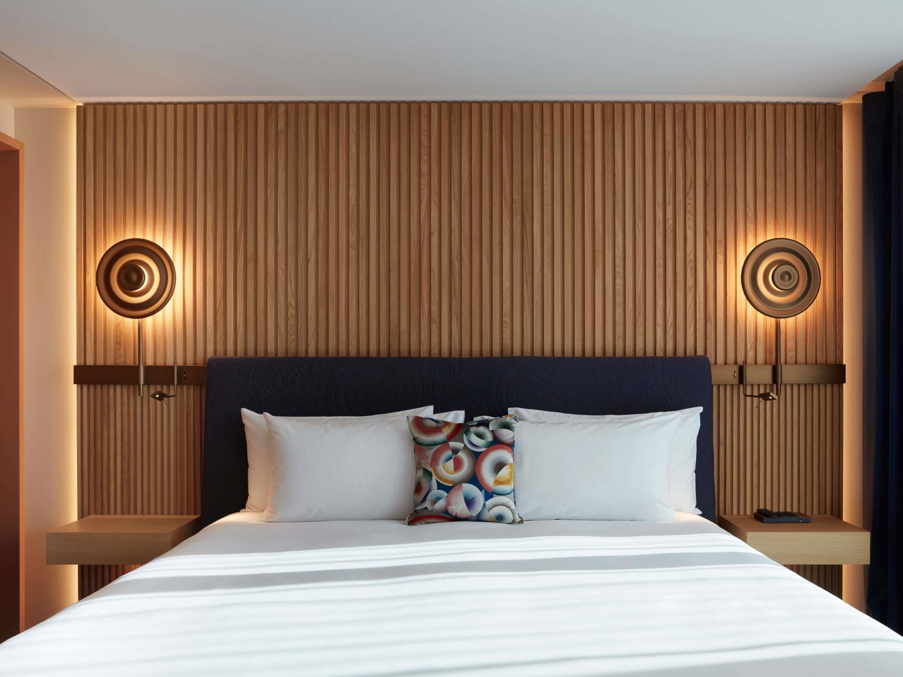 Premium bedding, down comforters, pillowtop beds, free minibar items
