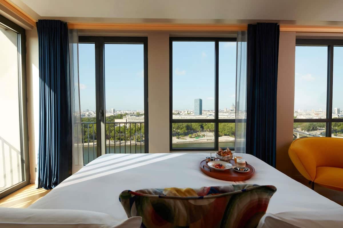 STUDIO BALCONY, 1 King, Corner Junior Suite with balcony, River Seine and Paris view | Premium bedding, down duvets, pillow-top beds, free minibar items