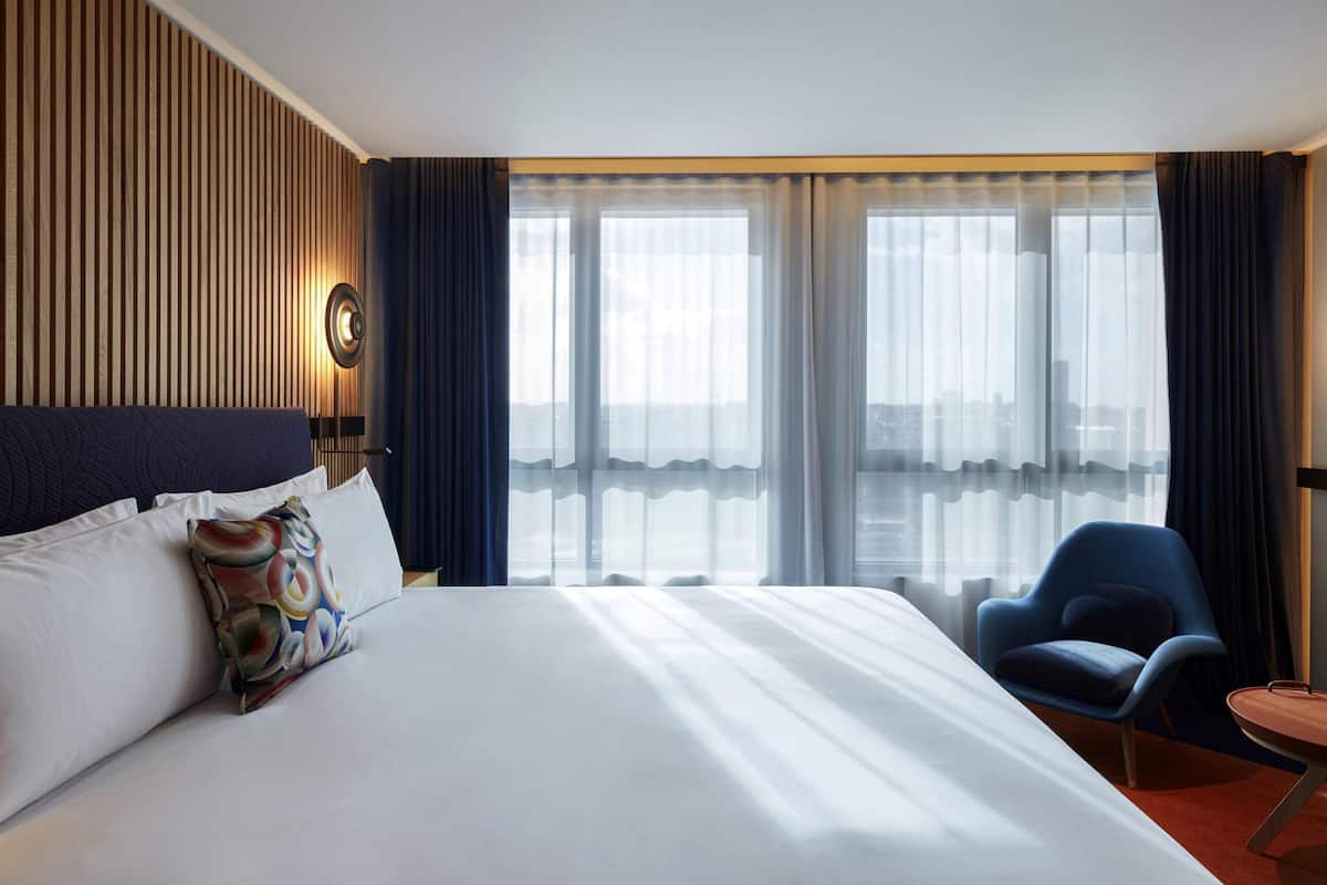 Premium bedding, down duvets, pillow-top beds, free minibar items