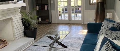 Executive House | Living area | 50-inch Smart TV with cable channels, TV, Netflix