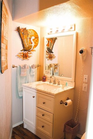 Bathtub, hair dryer, towels
