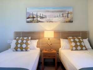 2 dormitorios, tabla de planchar con plancha, wifi gratis y ropa de cama