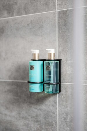 Shower, rainfall showerhead, hair dryer, towels