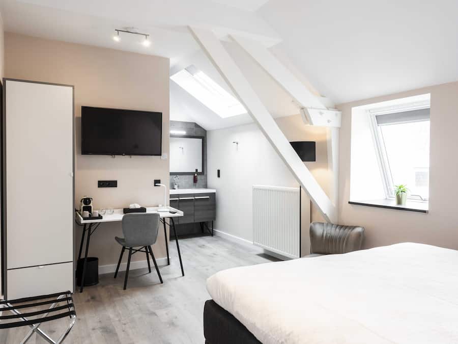 Ropa de cama de alta calidad y minibar