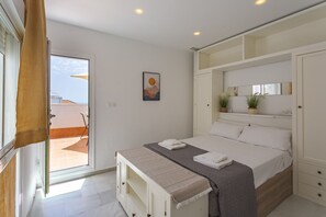 1 dormitorio, tabla de planchar con plancha, wifi gratis y ropa de cama