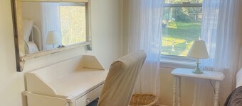 Downtown Cottage Style Home! Vintage vibes and comfortable amenities.