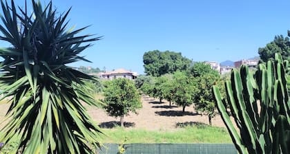 Casa dei Fiori con la vista a Taormina
