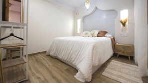 1 bedroom, desk, iron/ironing board, travel cot