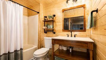 Bathtub, hair dryer, towels