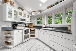 Fridge, microwave, oven, stovetop - Cozy & Beautiful Riverfront Home | Perfect Getaway (Wyoming)