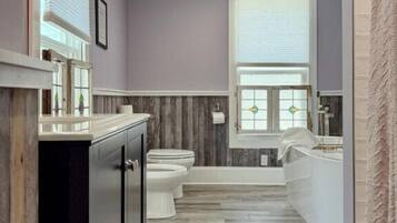 Bathtub, hair dryer, towels, soap