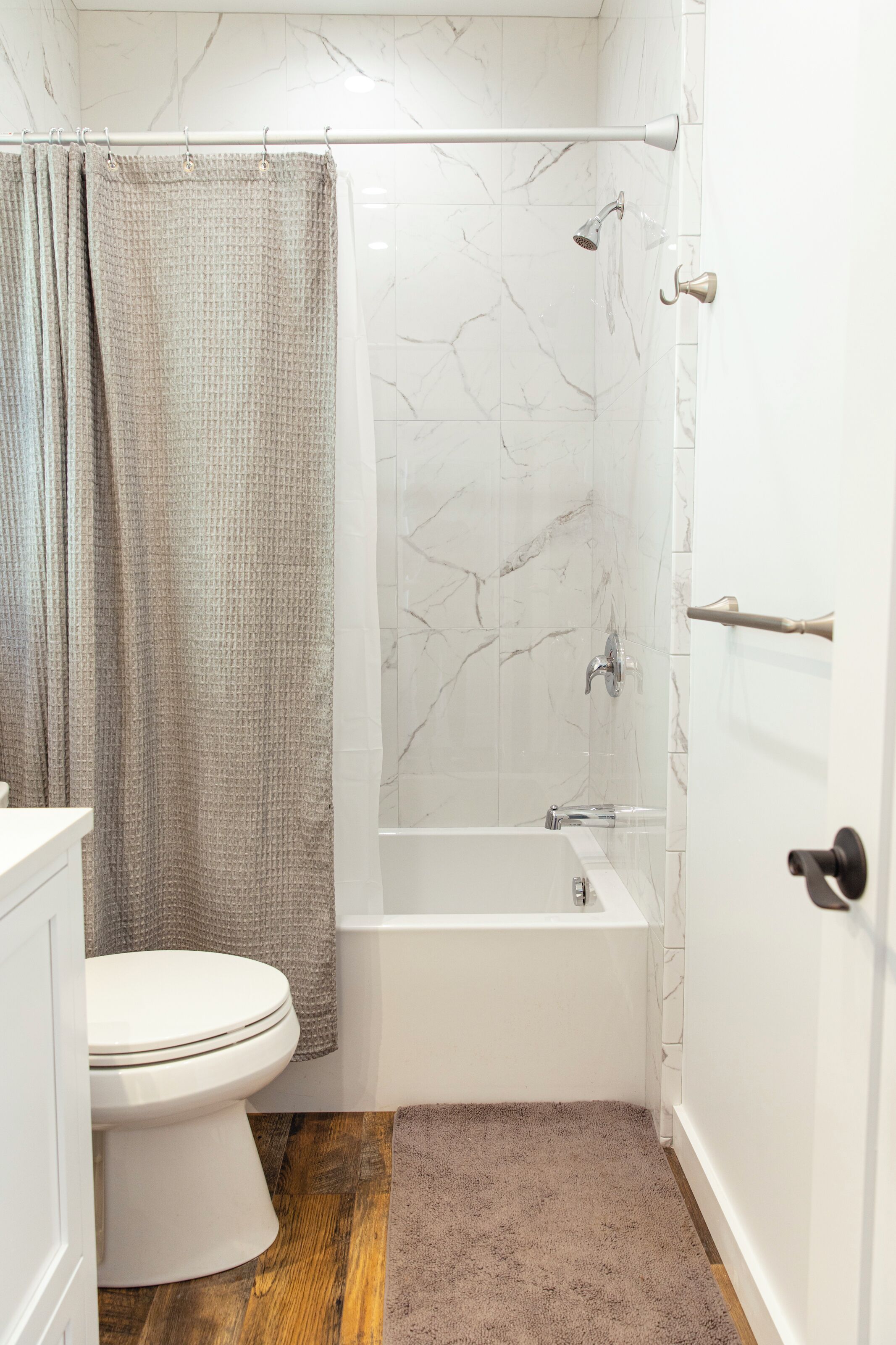 Combined shower/tub, hair dryer, towels, soap