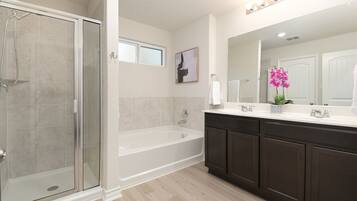 Combined shower/tub, towels, toilet paper