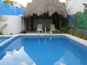 Outdoor pool, open 10:00 AM to 7:00 PM, pool loungers - Holmar Hotel (Isla Holbox)