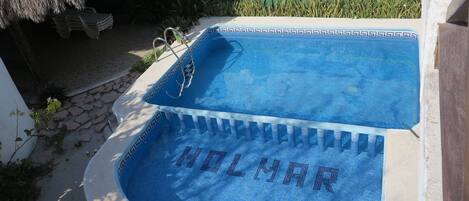 Outdoor pool, open 10:00 AM to 7:00 PM, sun loungers