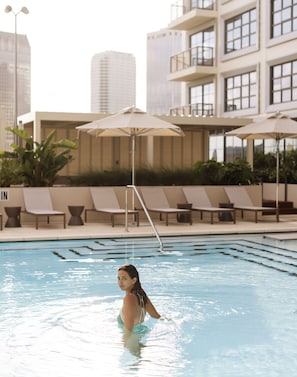 Outdoor pool, open 7:00 AM to 7:00 PM, free pool cabanas, pool umbrellas - ROOST Tampa (Tampa)