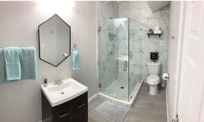 Shower, hair dryer, towels, soap