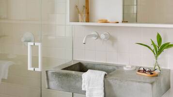 Designer toiletries, hair dryer, towels, soap