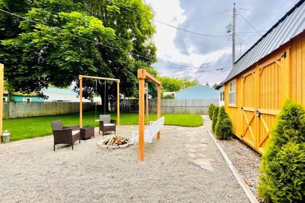 Private backyard with fire pit and BBQ
