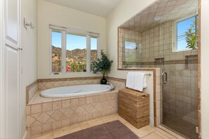 Combined shower/tub, hair dryer, towels, soap
