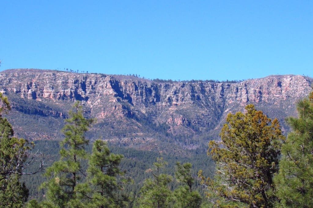 A mountainous landscape with a clear sky.